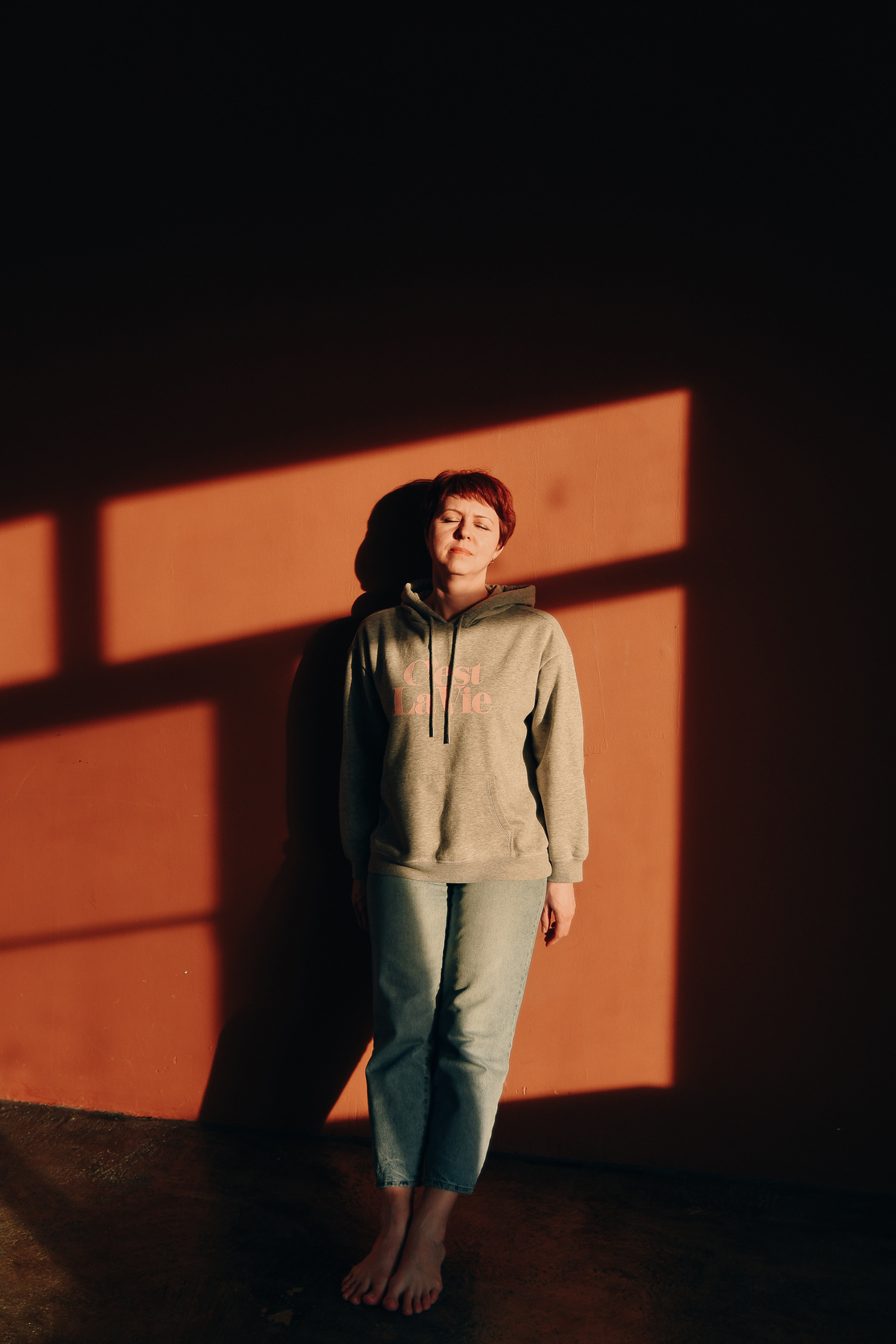 Portrait of Woman in Window Sunlight