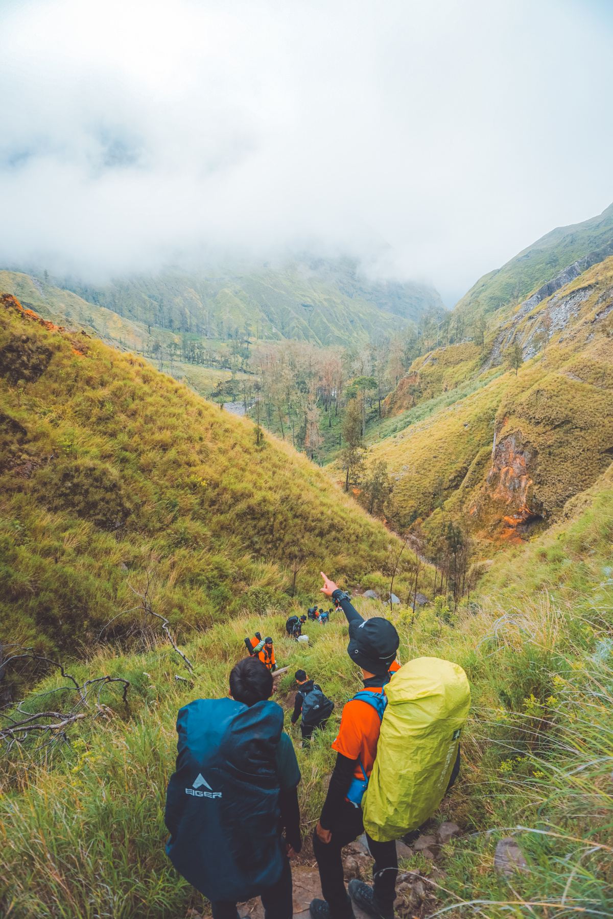 People Standing on the Mountain