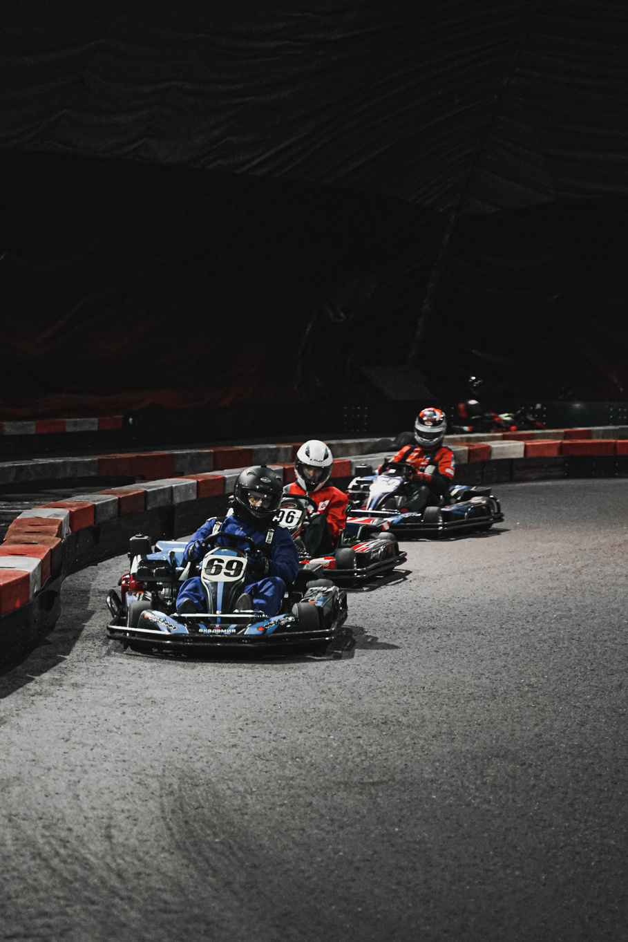 People Riding on Go Kart